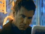 Blade Runner Deckard reads his newspaper