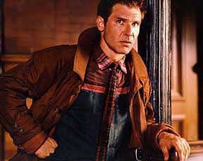 Deckard looks stylish in his coat and fancy shirt and tie