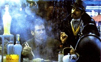 Gaff talks to Deckard at the Noodle Bar in Blade Runner